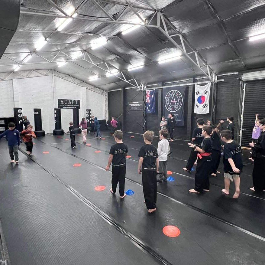 Kids playing at Martial arts class